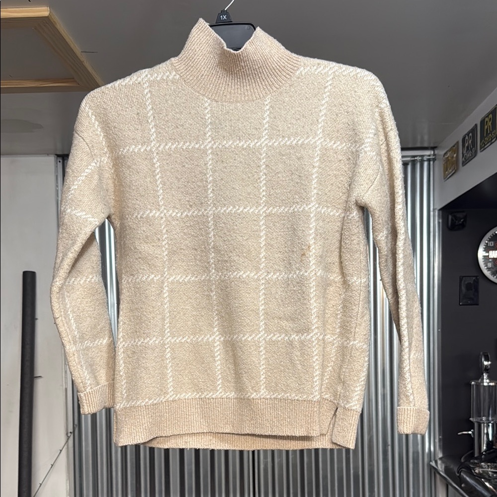 Beige Turtleneck Sweater with White Check Pattern